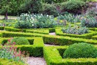 The Pigeon House Garden with Box hedges and roses - Rousham Park House and Garden, Bicester, Oxfordshire, design by William Kent 1685-1748