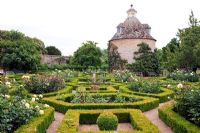 The Pigeon House Garden with Box hedges and roses - Rousham Park House and Garden, Bicester, Oxfordshire, designed by William Kent 1685-1748