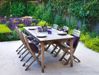 Table set for lunch in urban garden. London