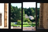 View to garden from inside barn - Croesllanfronfro Farm, Rogerstone, Newport, South Wales