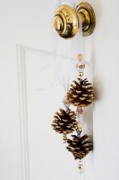 Pine cones decorated with beads