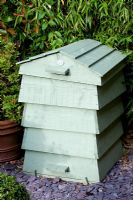 Decorative compost bin, in the shape of a bee hive