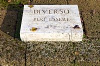 Inscription on stone slab. The Field. Il Bosco Della Ragnaia, San Giovanni D'Asso, Tuscany, Italy, October. 
