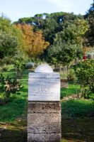 Inscription on plinth. The Field. Il Bosco Della Ragnaia, San Giovanni D'Asso, Tuscany, Italy, October. 
 