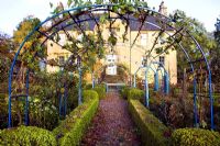 Box parterre and vine covered pergola - Old Allan grange, Munlochy, Ross-shire 
