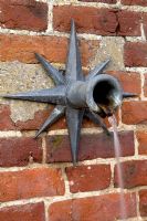 Wall mounted water feature with spout - Silverstone Farm, Norfolk
