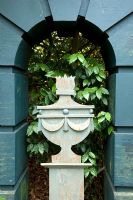 Ornamental urn on plinth - Silverstone Farm, Norfolk