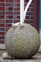Granite ball used as a base for a handrail - The Manor House, Germany