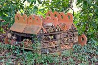 Insect hotel made from terracotta tiles and old broken pots - Pembury House
