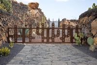 The metal Cactus gates, designed by Cesar Manrique -  El Jardin de Cactus, Lanzarote, Canary Islands