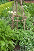 Spring border with wigwam plant support