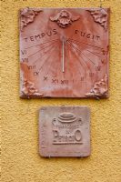 Terracotta sundial and plate
