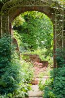 Arch in brick wall - Holbeach Hurn, Lincolnshire, UK, June 
