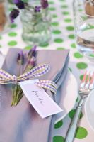 Table laid for entertaining with name tags