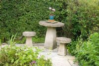 Stone mushroom shaped seats and table 