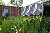 Wind turbines and steel-framed metal structure in the Stockton Drilling Winds of Change Garden, Gold Medal Winner - RHS Chelsea Flower Show 2011 