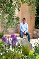 Paul Hervey Brookes sitting in the 'RNIB Garden' - Silver Gilt Medal Winner, RHS Chelsea Flower Show 2011
