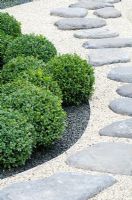 Clipped Buxus - Box balls, next to a gravel path with stepping stones - 'Virtual Reality Garden', Silver Medal Winner, RHS Hampton Court Flower Show 2011