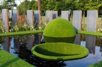 Reflective pool with grass dome - 'The World Vision Garden', Gold Medal Winner, RHS Hampton Court Flower Show 2011