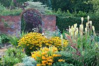 Penpergwm Lodge, Monmouthshire - autumn - the old potager garden with mixed perennials