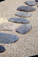 Stepping stones on gravel 