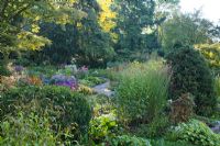 Mixed borders of perennials, grasses and shrubs - Karl Foerster Garden Potsdam Bornim, Germany 
 