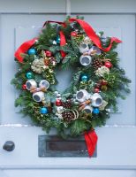 Wreath on grey front door - Highfield hollies, Hampshire