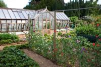 Veg garden with mixed Sweet Peas, Strawberries, Raspberries and greenhouse - The Manor House