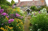 Cottage garden with Phlox, Rudbeckia and Inulas - Chiffchaffs, Bourton, Dorset, UK