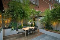 Small urban garden with seating area 