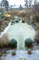 Formal town garden with first snow - Cambridge
