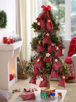 Christmas tree laden with tartan bags