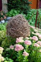 Decorative ball in flowerbed - Marx garden