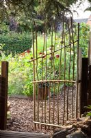 Gate made of bamboo canes - Marx Garden 
 