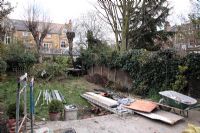Small urban garden full of rubbish ready for makeover. Before and after of London town garden