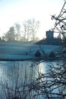 Frosty lake and garden in February 