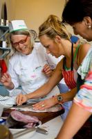 Darina Allen working with students in the classroom at Ballymaloe Cookery school