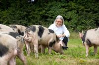 Darina Allen with pigs - Ballymaloe Cookery School