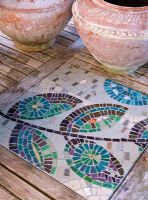 Patio table with mosaic insets detail