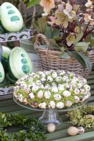 Wreath made of quail eggs and moss 