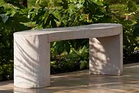 Contemporary urban stone seat and Ricinus communis - 'Off the Shelf', Silver Gilt medal winner, RHS Cardiff Show 2012