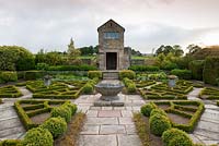 The Fancy Garden includes a gazebo, from which to gaze upon the garden, and a pattern made from box based on a Tudor rose pattern - Herterton House, Hartington, Northumberland, UK