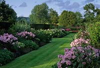 Summer borders in large country garden 