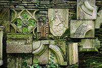 The 'Wall of Gifts' in the Stumpery containing various pieces of architectural stone, some given to the Prince others collected by him.  