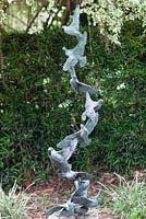 Bronze 'Doves of Peace' sculpture in the White Garden at Leu Gardens, Orlando, Florida