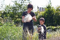 Linda and Simian Bastin Collecting seeds - Bastin Nursery 