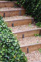 Newly made garden steps topped with shingle