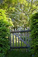 Wooden gate at the entrance to the vegetable garden, Wyckhurst Kent