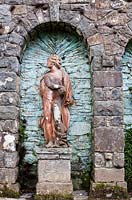Plas Brondanw Garden, Wales. Niche with statue