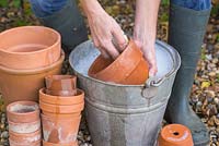 Washing pots to sterilise for following year